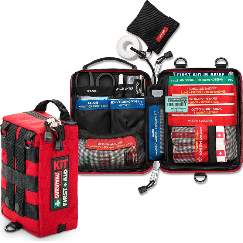 Red Survival Handy First Aid kit opened with labelled emergency supplies and compact carry case — Adventure Awaits