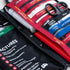 Close-up of Survival First Aid kit with colour-coded supplies, shears and fracture guide — Adventure Awaits
