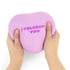 Hands squeezing lilac The Big Squij heart squishy with I Tolerate You message Adventure Awaits