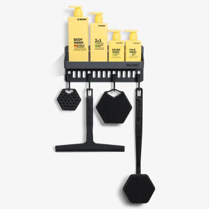 tooletries tool wall shown on white background with products on the shelf and scrubbers and squeegee hanging from hooks