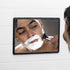 Charcoal shower mirror in use for shaving with razor on white tiles — Adventure Awaits