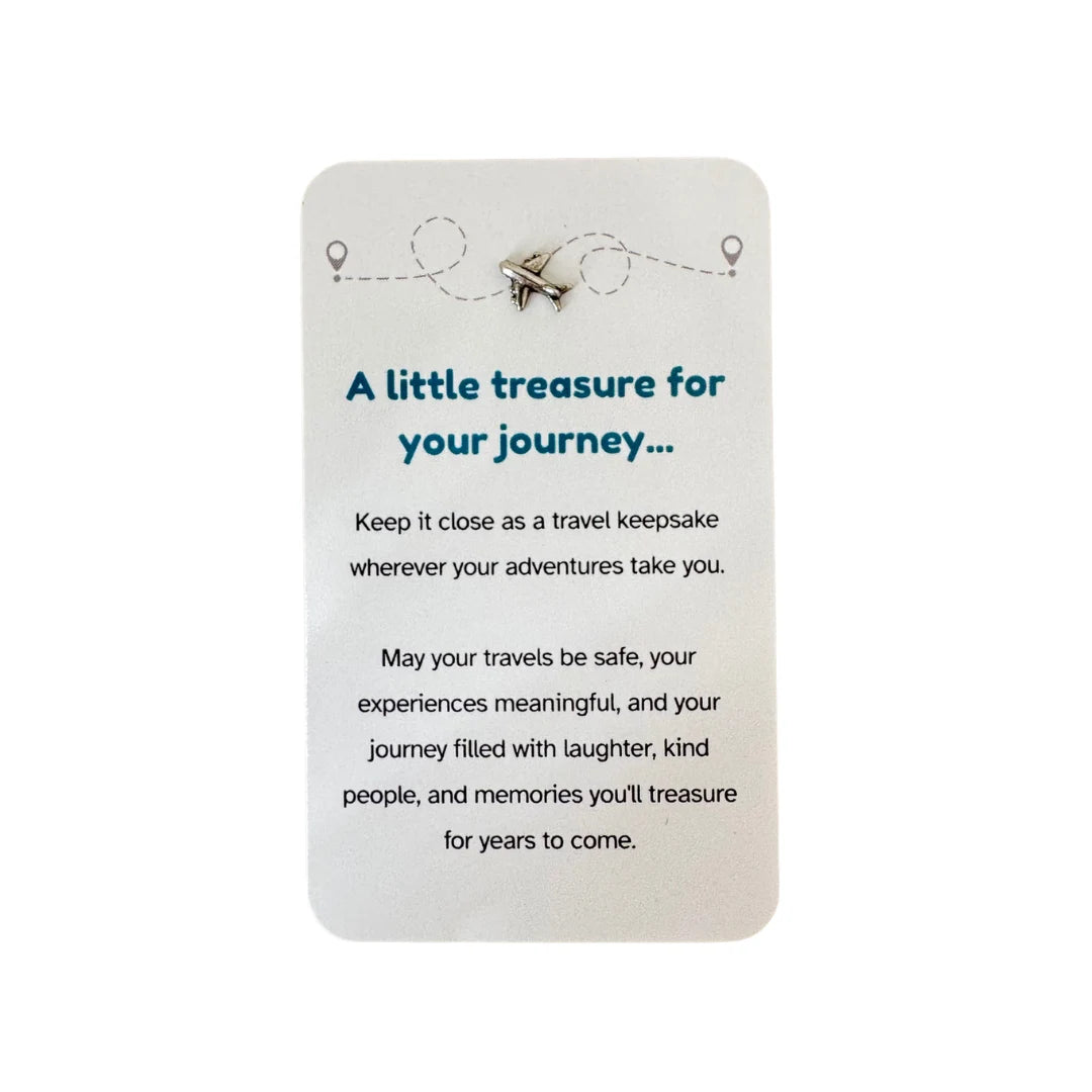 Travel keepsake card with silver aeroplane charm and journey message — Adventure Awaits