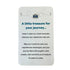 Travel keepsake card with blue enamel suitcase charm and journey message — Adventure Awaits