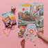 Werkshoppe Road Trip Puzzle being put together with books and binoculars next to it