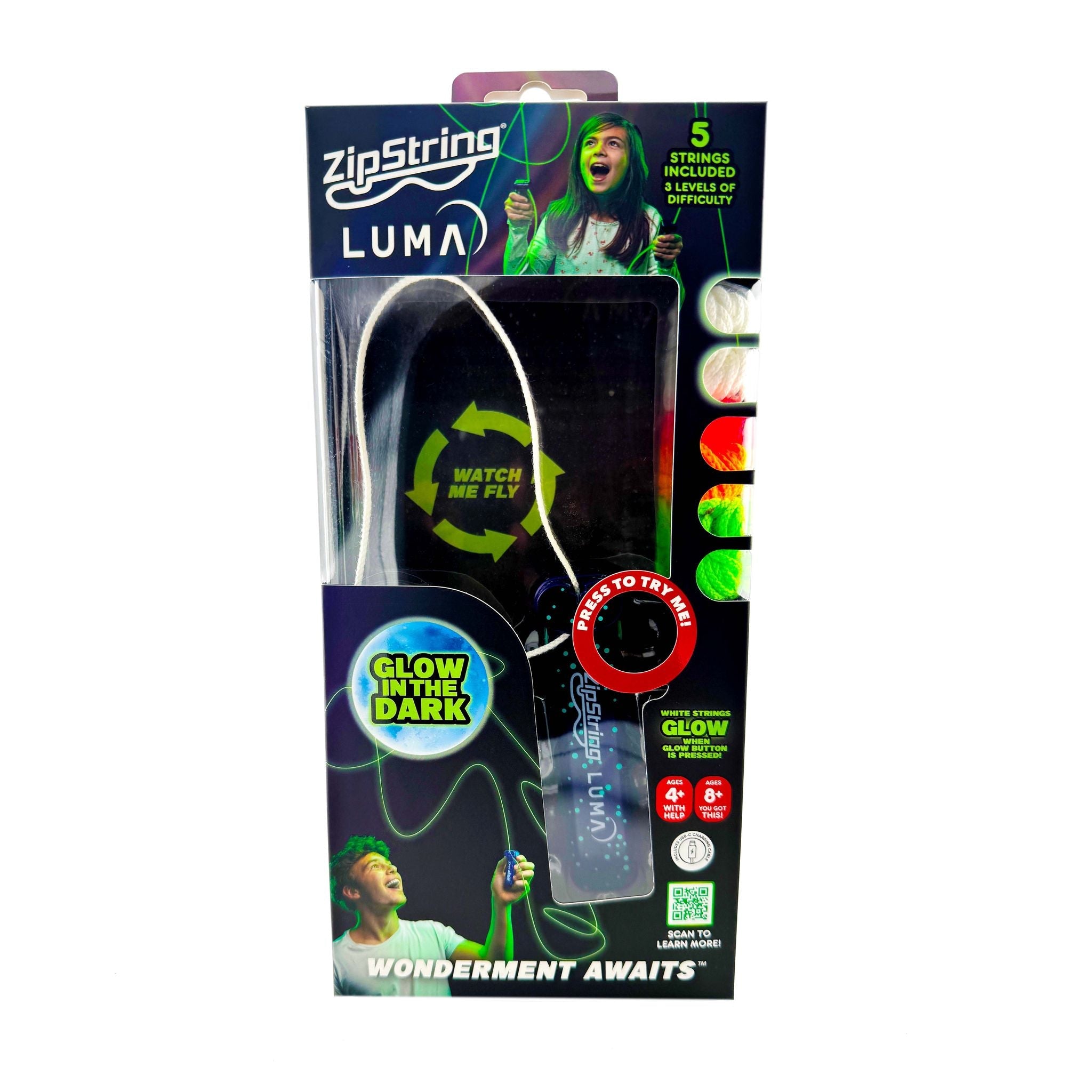ZipString Luma Glow in the Dark Edition toy in retail packaging, featuring a black handheld string launcher with green glow accents and neon coloured strings.