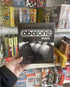 Abalone Travel strategy game box held in store — Adventure Awaits