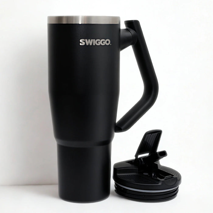 black Swiggo insulated travel tumbler with handle and matching flip lid, large reusable drink cup for hot or cold drinks Adventure Awaits