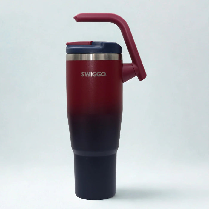 Swiggo insulated travel tumbler with handle in red to navy gradient, large reusable drink cup with flip lid and straw for hot or cold drinks Adventure Awaits