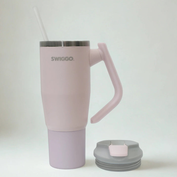 pink Swiggo insulated travel tumbler with handle and straw, lid shown beside, large reusable drink cup for hot or cold drinks Adventure Awaits