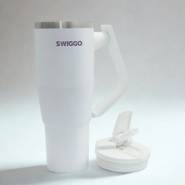 white Swiggo insulated travel tumbler with handle and matching lid with flip spout, large reusable drink cup for hot or cold drinks Adventure Awaits
