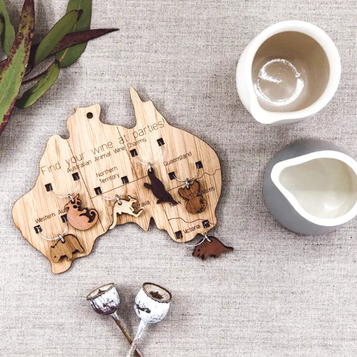 Australia-shaped wooden wine charm set with native animal markers for each state — Adventure Awaits