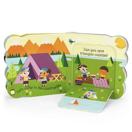 Children find triangles at a campsite picnic in the Babies Love Camping lift-a-flap book, Adventure Awaits