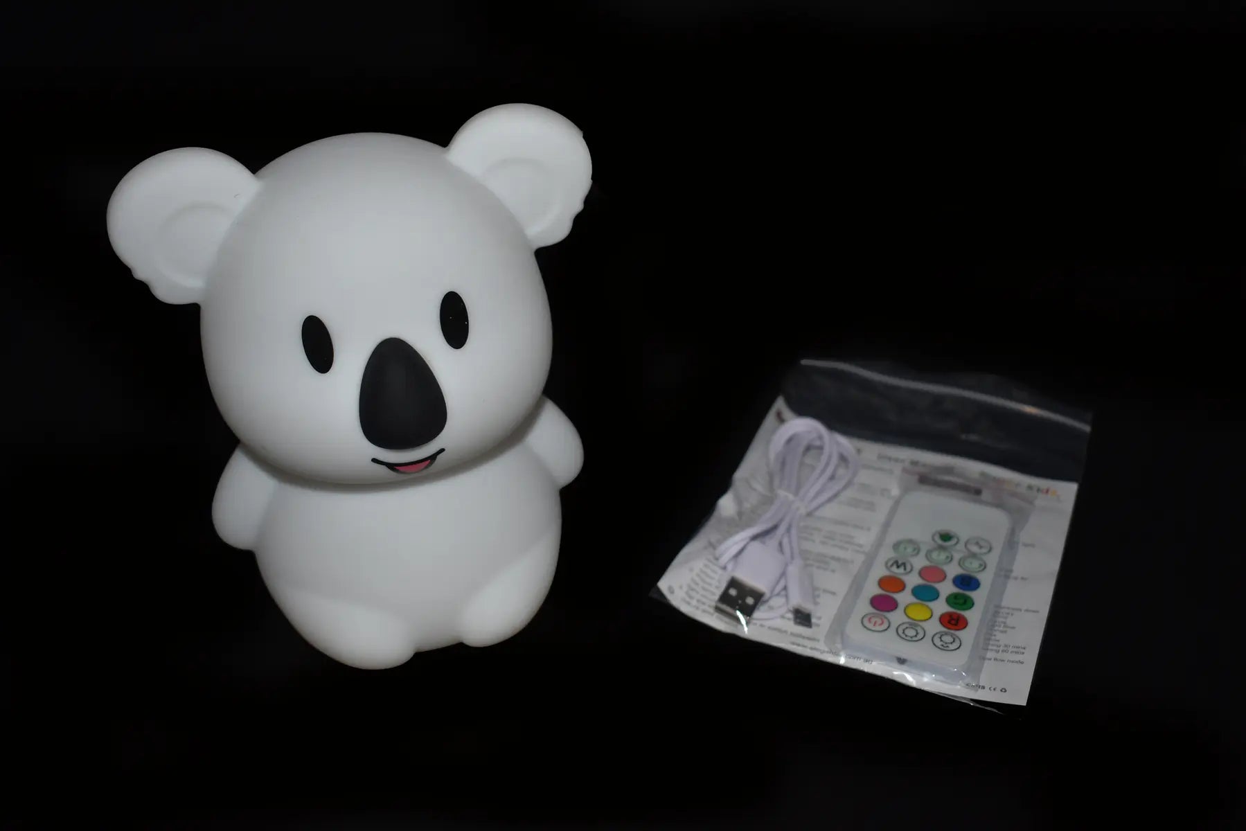 Koala Dream Bedtime Buddy koala night light with remote control, USB cable and instructions — Adventure Awaits