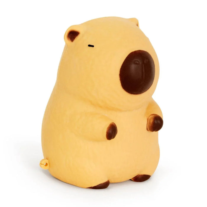 The Big Squii jumbo capybara squishy with tan body, tiny ears and brown nose — Adventure Awaits