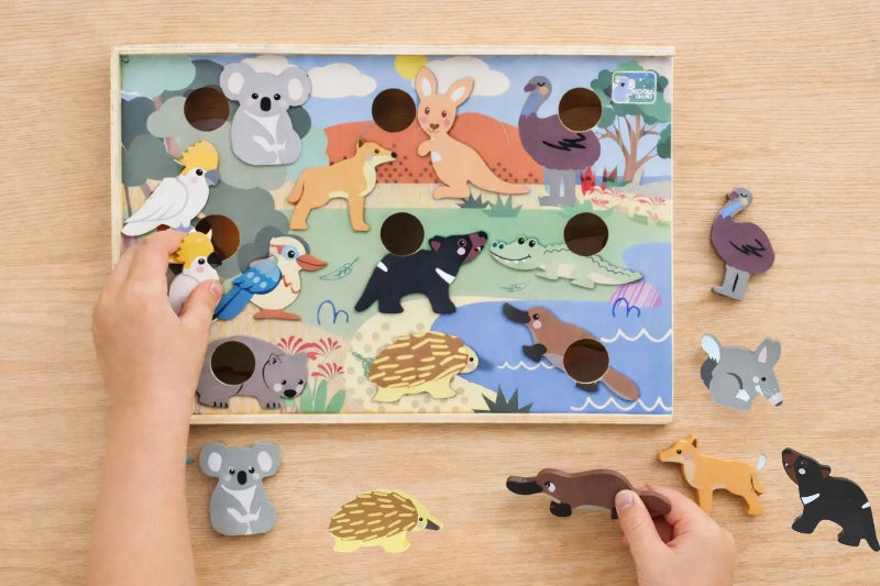 Child playing with Koala Dream Aussie Animal Hotel wooden animal pieces — Adventure Awaits