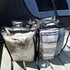 Clear Campaq storage bags packed with towels on caravan seating for organised camping trips — Adventure Awaits
