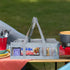Campaq clear grey storage bag holding pantry items on a campsite table — Adventure Awaits