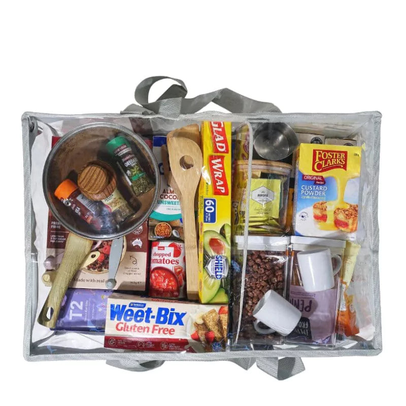 Campaq clear grey storage bag packed with camp kitchen pantry gear and cookware — Adventure Awaits