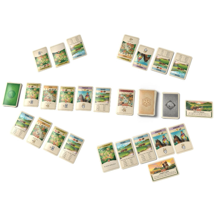 CATAN On the Road card game laid out with colourful resource, development and player cards — Adventure Awaits