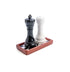 Chess salt and pepper shakers standing on checkerboard tray — Adventure Awaits