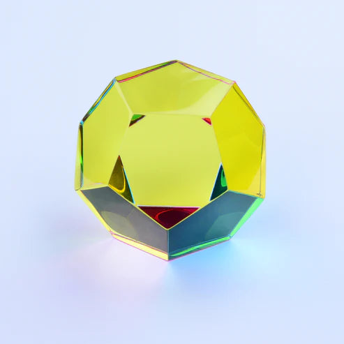 CMY Cubes Mundus yellow dodecahedron with soft rainbow reflections on a pale background — Adventure Awaits