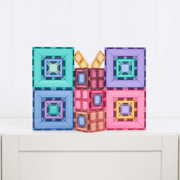 colourful Connetix magnetic tile structures arranged in square designs, creative construction toy for imaginative play and learning at home or travel Adventure Awaits