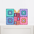 colourful Connetix magnetic tile structures arranged in square designs, creative construction toy for imaginative play and learning at home or travel Adventure Awaits