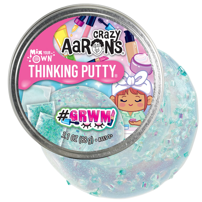 Crazy Aaron’s #GRWM Mix Your Own Thinking Putty with clear shimmer putty and pastel beauty themed mix ins