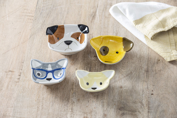 Dog ceramic measuring cups on wooden bench with tea towel — Adventure Awaits