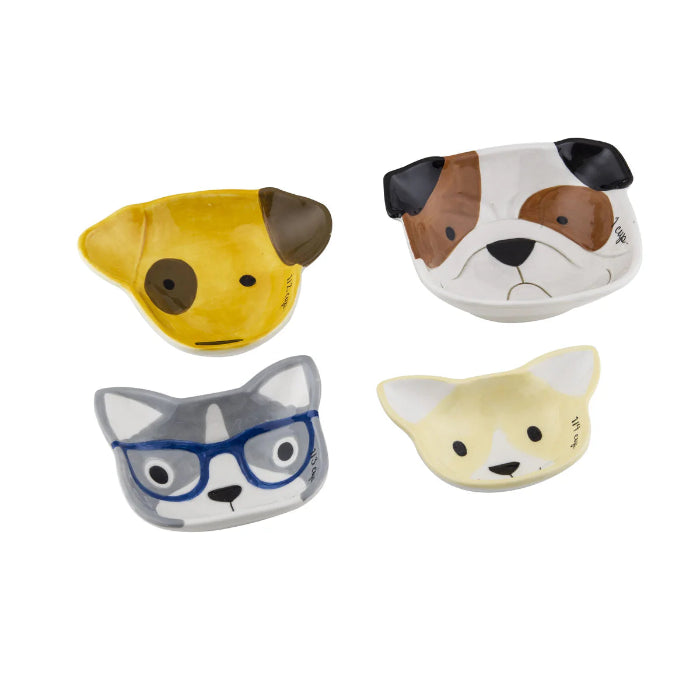 Dog ceramic measuring cups in four cute designs on white background — Adventure Awaits