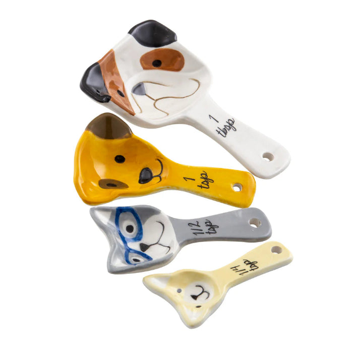 Dog ceramic measuring spoons in four sizes on white background — Adventure Awaits