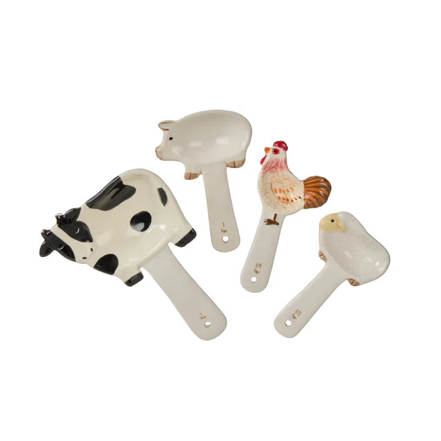 Set of four ceramic farm animal measuring spoons with cow, pig, rooster and sheep designs — Adventure Awaits