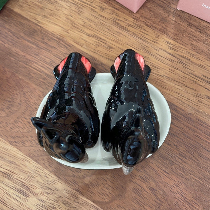 Porcelain cockatoo salt and pepper shakers
