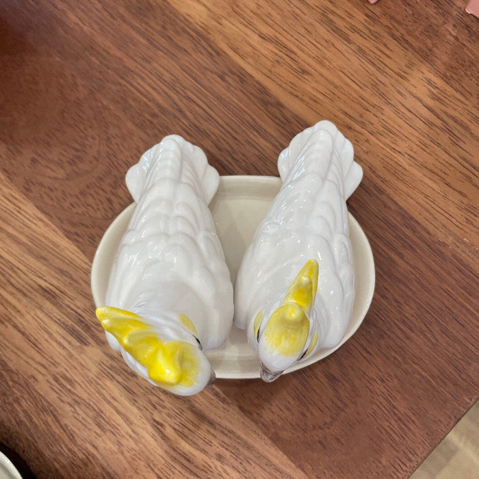 Porcelain cockatoo salt and pepper shakers