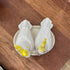 Porcelain cockatoo salt and pepper shakers