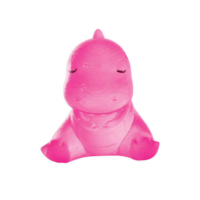 Pink mini dinosaur squeeze toy with closed eyes, soft textured sensory fidget toy for kids calming play Adventure Awaits