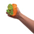 Hand squeezing green and orange mini dinosaur toys, soft sensory fidget toys for kids stress relief and calming play Adventure Awaits