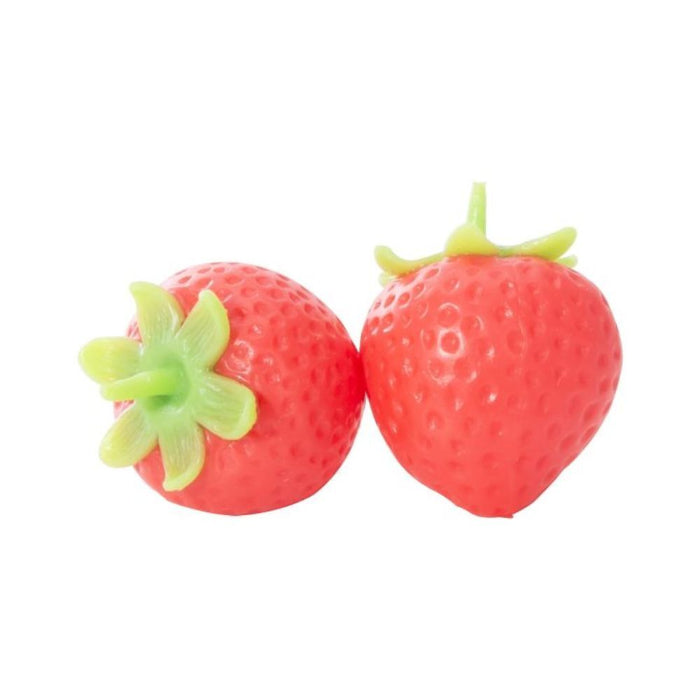 two soft strawberry squishy toys with textured red surface and green tops, sensory toys for kids play and stress relief Adventure Awaits