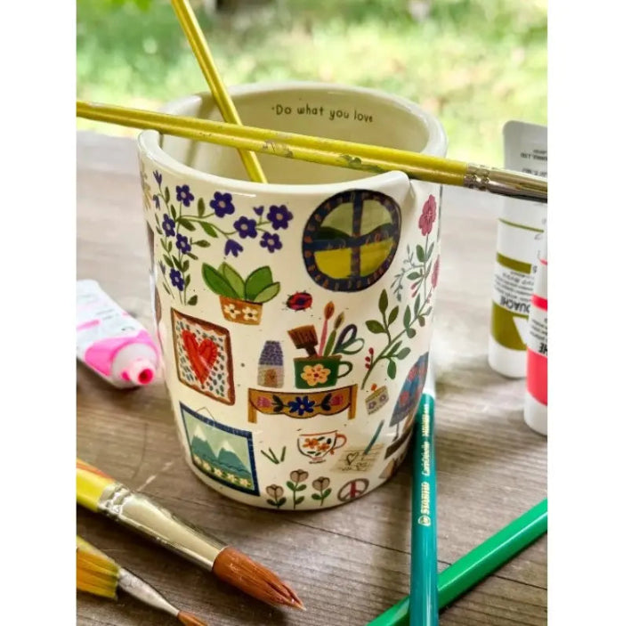 Natural Life ceramic art mug holding paintbrushes with colourful home, floral and craft illustrations — Adventure Awaits