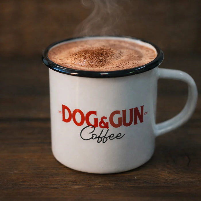 Steaming Dog & Gun hot chocolate in white enamel camp mug — Adventure Awaits