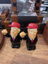 Presidential caricature salt and pepper shakers with red caps on shop shelf — Adventure Awaits