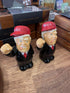 Presidential caricature salt and pepper shakers with red MAGA caps on wooden shop shelf — Adventure Awaits