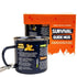 Survival Guide enamel mug with printed outdoor tips and carabiner handle, shown with branded gift box packaging for camping and travel Adventure Awaits
