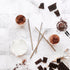 Ever Eco stainless steel smoothie straws beside chocolate drinks on marble bench — Adventure Awaits
