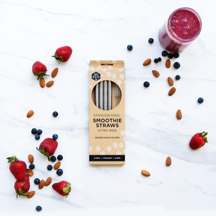 Ever Eco extra-wide stainless steel smoothie straws in a four-pack beside fresh berries — Adventure Awaits