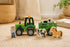 Koala Dream wooden farm tractor and trailer toy with farm animal figures in a playroom setting — Adventure Awaits