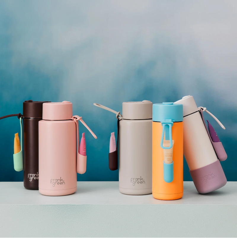 Frank Green reusable drink bottles in pastel colours with handy carry straps and lip gloss holders — Adventure Awaits