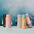 Frank Green reusable drink bottles in pastel colours with handy carry straps and lip gloss holders — Adventure Awaits