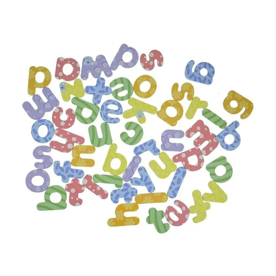 A pile of colorful alphabet letter confetti pieces in various shapes and patterns, including polka dots and stripes, scattered on a plain white background.