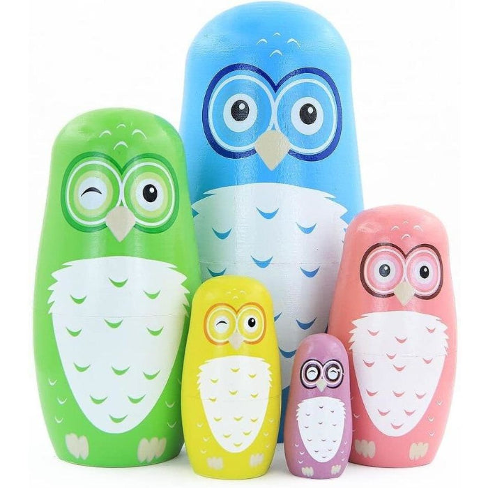 Colourful owl nesting dolls in blue, green, yellow, pink and purple sizes — Adventure Awaits